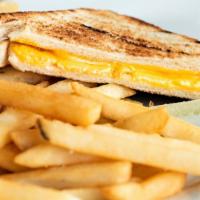 Kids' 1/2 Grilled Cheese · Served with fries.