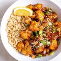 Orange Sesame Cauliflower · Flash-fried cauliflower with peppers & onions, green onions, sesame seeds, and our house-mad...