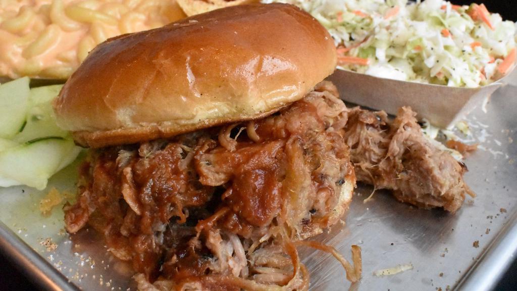 Bob'S Signature Pulled Pork · Perfectly seasoned, Applewood-smoked Pork, slow cooked to delicious, tender juiciness. Choose your sauce!