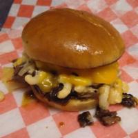 Bob'S Mac & Moo · Brisket dressed with lancaster bbq sauce, sautéed onions and topped with mac and cheese and...