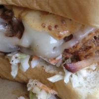 Bbb Reuben · Pulled-pork topped with cici’s sweet sauce, sautéed onions, swiss cheese, coleslaw and spic...