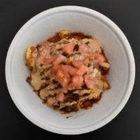 Ultimate Brisket Sundae · Corn casserole, brisket, sautéed onions, lancaster sauce, bbq remoulade, diced tomatoes.