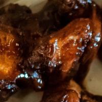 1# Traditional · A pound of beer brined wings fried then finished on the char-broiler.

Upon request served w...