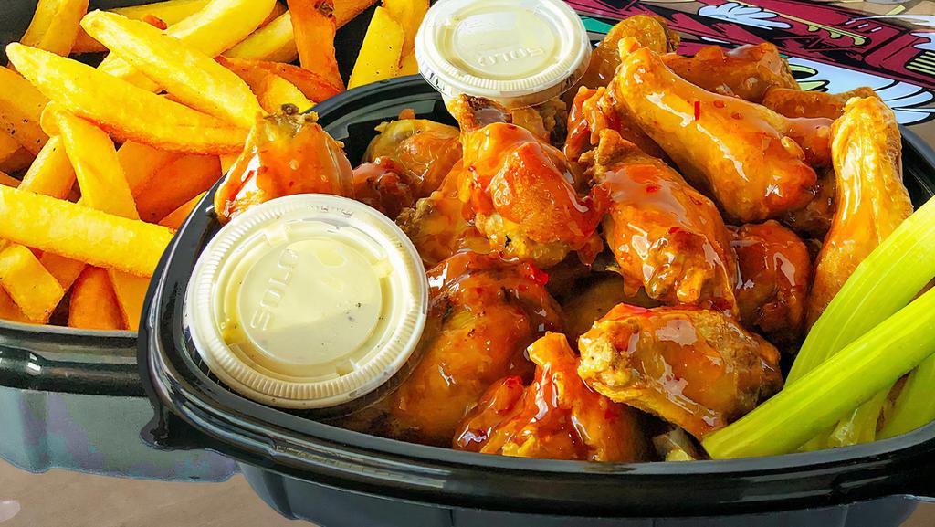 10 Piece Meal · 10 wings, regular and boneless with choice of sauce (served on the side), 2 oz dressing of choice, 1 side of fries or tots, and 2 pieces of celery.