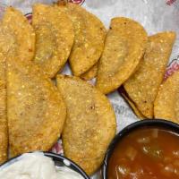Mini Tacos · BP Mini tacos are tapas style tacos made with crispy corn tortillas, filled with seasoned ch...