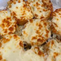Garlic Cheese Bread · BP Garlic Cheese Bread is French bread dipped in butter, sprinkled with garlic powder and pa...