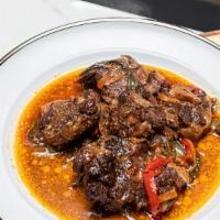 Brown Stew Oxtails · Seasoned to the bone with a combination of Jamaican and America's finest herbs and spices. A...