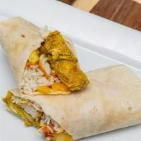 Delicious Wrap · Curry chicken breast, steam vegetables and cabbage, and choice of white rice or rice and peas.