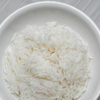 Traditional White Rice · Simply steamed with a touch of butter, salt and alkaline water. This side dish serves as the...