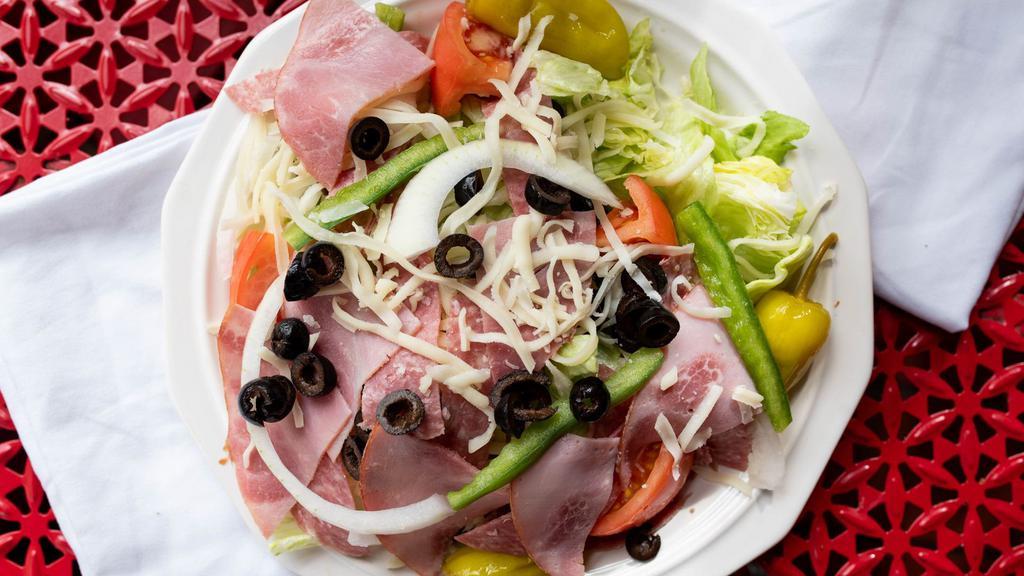 Antipasto Salad · Lettuce, tomato, onions, green peppers, black olives, mozzarella, pepperoncini, ham, and salami.