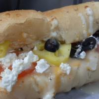 The Big Greek · Double the size! Our three cheese blend of mozzarella, monterey jack, and cheddar with feta,...