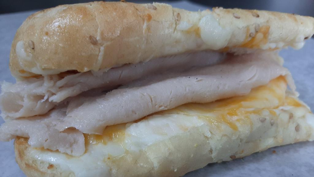 The Big Turkey & Cheese · Double the size! Our three cheese blend of mozzarella, monterey jack, and cheddar with sliced turkey on a toasted bun.