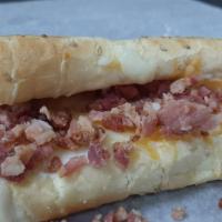 The Bacon & Cheese · Our three cheese blend of mozzarella, monterey jack, and cheddar with crispy bacon on a toas...