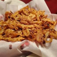 Our Famous Onion Rings · Our Famous Hand Dipped Onion Straws deep fried to a golden brown