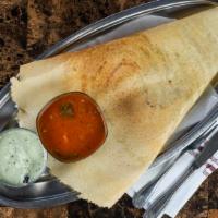 Mysore Masala Dosa · Spiced lentil and rice crepe, served with spiced potatoes, sambhar and chutney.