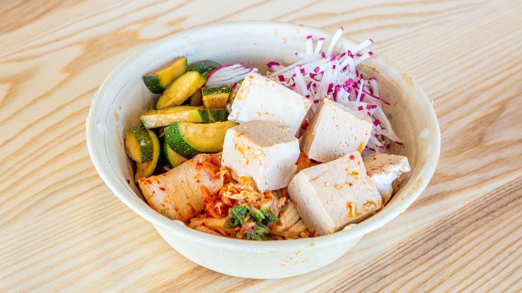 Tofu Bap · Soy and sesame tofu, chilled sweet and spicy noodles, kimchi, zucchini, and radish.