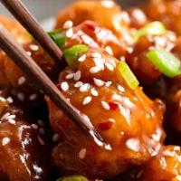Sesame Chicken · Spicy. Hot crispy chunks of chicken with chef's special sauce on broccoli bed. Topped with s...