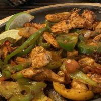 Las Fajitas Chicken · Served with rice and beans (charro, black or refried) guacamole, sour cream, pico de gallo, ...