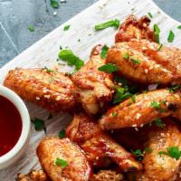 16 Piece Chicken Wings · 16 Piece Bone-In Chicken Wings with your choice of one of our special sauces.