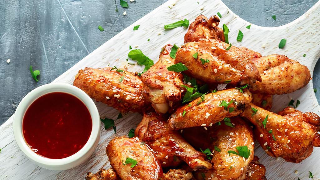 16 Piece Chicken Wings · 16 Piece Bone-In Chicken Wings with your choice of one of our special sauces.