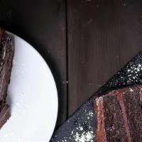 Towering Chocolate Cake · Serves up to four people.