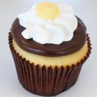 Boston Cream Pie · Vanilla bean cake filled with Bavarian cream, frosted with fudge and whipped cream and toppe...