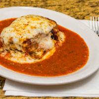 Lasagna · Our most popular dish... Layers of seasoned ground beef, cheeses, and fresh pasta topped wit...