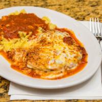 Chicken Parmigiana · Tender breast of chicken filled with our special blend of four cheeses then baked in Clara's...