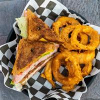 Club Sandwich · Three slices of white or wheat bread toasted and loaded with ham, turkey, bacon, swiss and A...