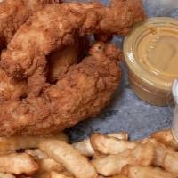 Chicken Strips · Tender Chicken Breast, cut battered and fried to golden brown.