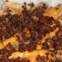 Loaded Fries · Our Basket of Fries topped with Spicy Nacho Cheese and Bacon