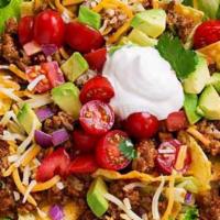Taco Salad · Beef, chicken, or seafood, beans, lettuce, green peppers, onions, cheese, black olives, cila...