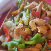 Chicken Fajitas · Marinated Chicken Breast grilled with onions and green peppers. Served sizzling hot with sal...