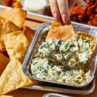 Spinach & Artichoke Dip · Spinach, artichoke, brie, and cream cheese. Served hot with flour tortilla chips