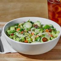 The Brussell Crowe · Brussel sprouts, shaved parmesan, dates, sliced almonds, avocado, carrots, honey mustard vin...