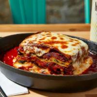 Momma'S Lasagna · Beef bolognese lasagna with spinach, mozzarella, ricotta, and parmesan cheese