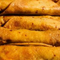 Flautas (6 To An Order) · Chicken (seasoned chicken, wrapped in a corn tortillas and fried to a golden brown).
