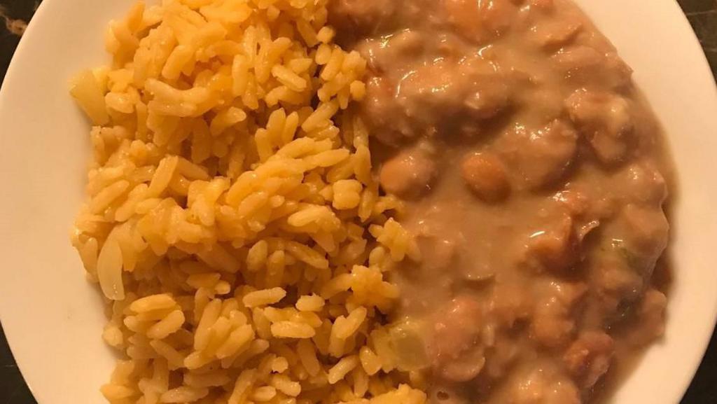 Beans And Rice · Single serving of refried beans and rice