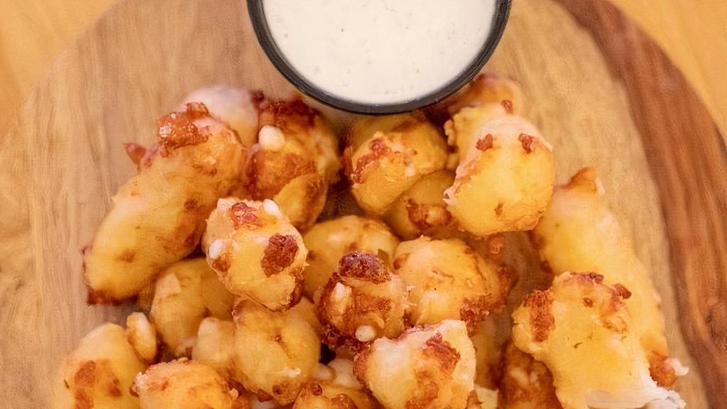 Fresh Battered Cheese Curds · Ellsworth Cheese Curds Battered In-House & Fried To Order. Served With Ranch Dressing.