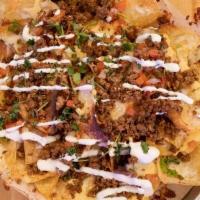 Nachos · Fresh Fried Tortilla Chips Layered With A Five Cheese Blend & Topped With Queso Cheese, Chic...