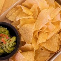 Chips And Guacamole · Guacamole Served With House Fried Tortilla Chips.