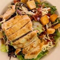 Pub Salad · Grilled Chicken, Five Cheese Blend, Diced Tomatoes, Red Onion, Cucumber, Chopped Smoked Baco...