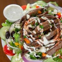 Gyro Salad · Our fresh Greek salad topped with savory beef and lamb gyro meat.