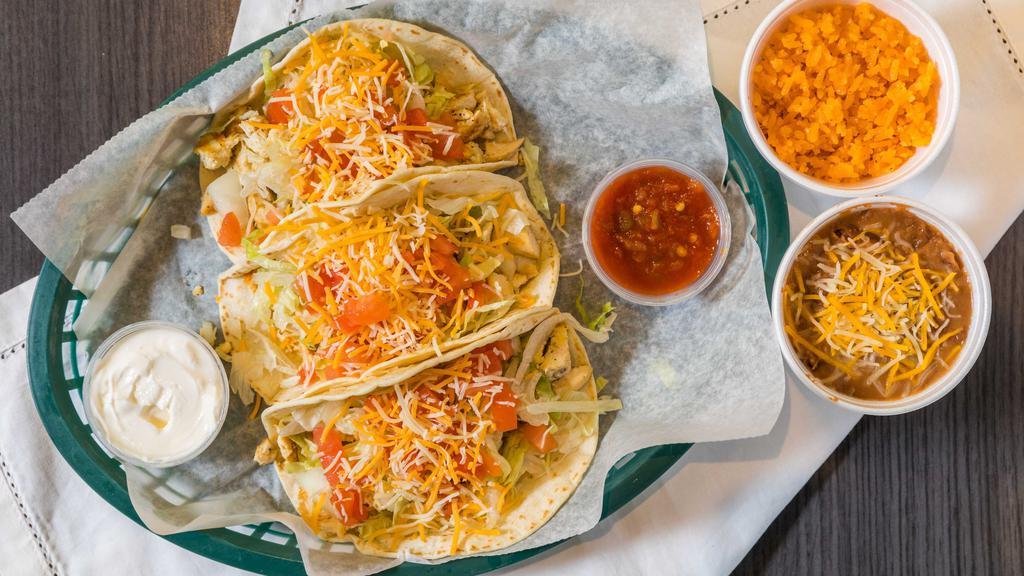 3 Supreme Tacos · Choice of chicken, ground beef or steak with an extra charge, with lettuce, tomato, raw onion, shredded cheese, sour cream, side of salsa. Choice of tortilla (soft flour, soft corn, or hard shell).