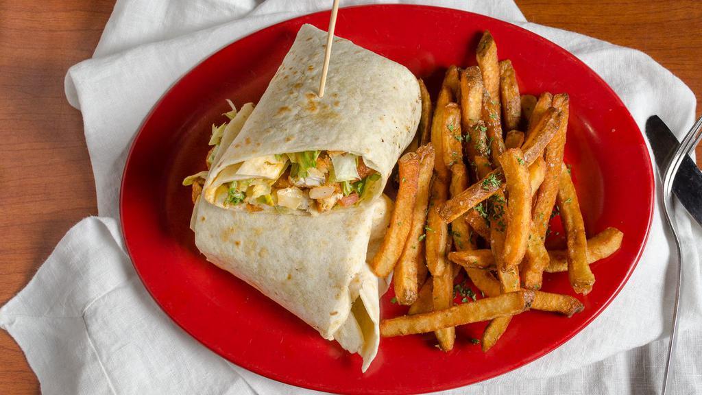 Buffalo Chicken Wrap · Battered or grilled chicken tossed with lettuce, tomato, onion, and cheese, with your choice of hot or mild buffalo, ranch or blue cheese dressing.