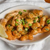 Spicy Fried Shrimp · Fried shrimp tossed in our chili aioli with green onions.