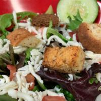 House Salad · Field greens with diced onion, diced tomato, three cheese blend, and croutons. Add large siz...