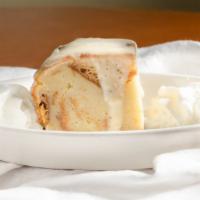 Vanilla Bread Pudding · House-made bread pudding topped with a vanilla cream cheese sauce.