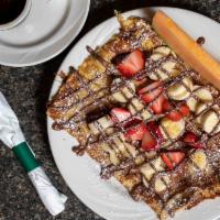 Nutella Crepes · Melt-in-your-mouth crepes layered with decadent hazelnut chocolate spread, sliced bananas an...