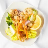 Jhinga Karahi · Gluten free. Deep fried shrimp marinated in vinegar and lemon juice along with garlic, ginge...